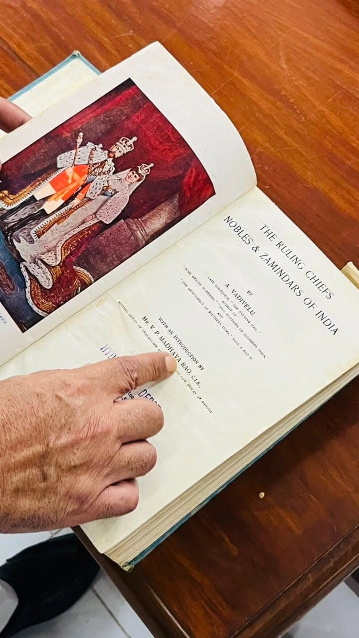 An open copy of The Ruling Chiefs, Nobles and Zamindars of India, with a colour frontispiece